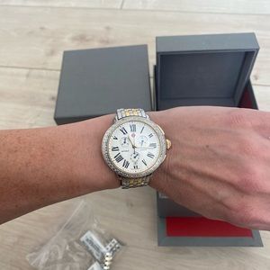 Gold and silver diamond Michele watch.
